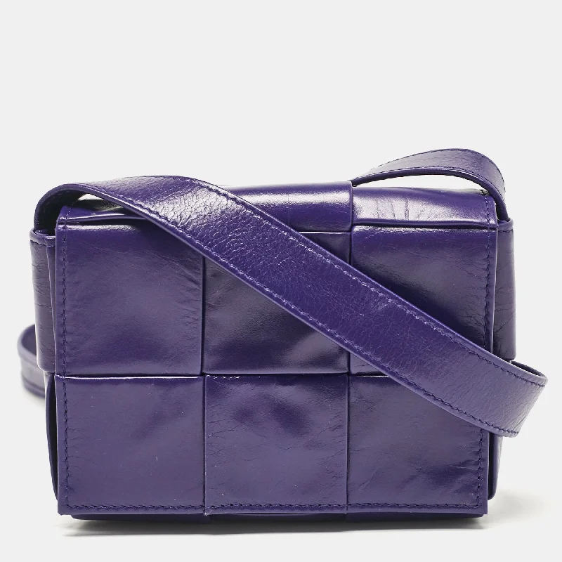 Metallic Crossbody Bag in Silver for New Year's Eve and Special CelebrationsBottega Veneta Purple Intrecciato Leather Mini Candy Cassette Crossbody Bag